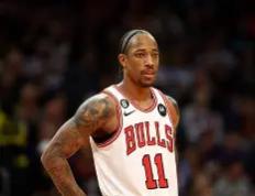 极速竞猜- 德罗巴和nba球员合影 